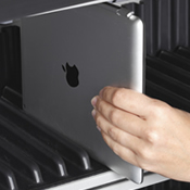 The shelf insert ensures that stored tablets stay upright and organized.