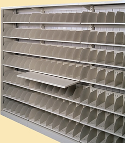 The option of steel shelves is most commonly used for ring binders and computer printouts. The strong flat shelf units utilize the same bolt-free post connection. Choose from 30" or 42" long shelves in letter or legal size. The height of the shelves is adjustable on 1" centers to reflect the height of the media.